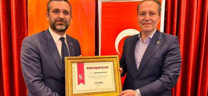 Erhan Erdoğan'a Erbakan'dan teşekkür plaketi