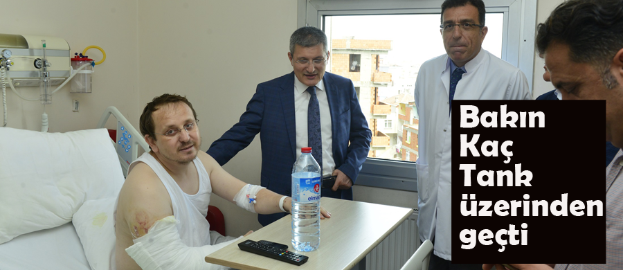 Tankların altına yatan adam